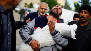 İsrail'in Gazze Şeridi'ne yönelik saldırılarında ölenlerin sayısı 15 bin 207'ye yükseldi